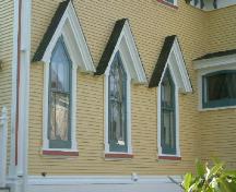 An oblique view of windows on the north side of the rear section of the Job Hatfield House, Yarmouth, NS, 2006.; Heritage Division, NS Dept. of Tourism, Culture and Heritage, 2006.