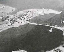 Historic photo with the Lanigan and Bowser Mill Site in the upper right portion of photo, 1945; Village of Rexton