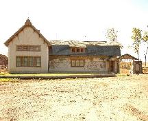 Front elevation with view of artist's murals, 2004.; Government of Saskatchewan, Calvin Fehr, 2004.