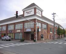 An angled view of the Gloucester building after renovations. It is now called Gloucester Place but still has the original "Gloucester Hotel" inscription on the side of the building.; City of Bathurst