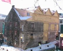 Exterior photo of the rear facade of Yellow Belly Corner, shown during restoration work, photo circa 2005.; HFNL 2006