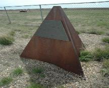 View of cairn at the Canadian Pacific Langevin Number 1 and 2 Gas Wells Provincial Historic Resource site (May 2006); Alberta Culture and Community Spirit, Historic Resources Management Branch, 2006