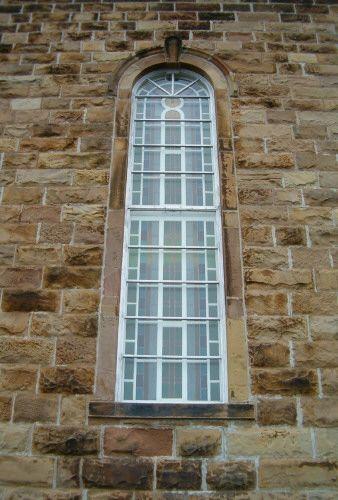 Window with keystone and lug sill
