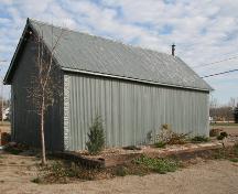 Secondary elevations, from the southwest, of the Saint-Claude Gaol Museum, St. Claude, 2006; Historic Resources Branch, Manitoba Culture, Heritage and Tourism, 2006