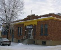Front Facade of Sask Tel Building in Melfort highlighting the brick and stone detailing, 2007.; Government of Saskatchewan, Bernard Flaman, 2007.