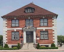 Concrete quoins and belt courses accentuate the red brick in this Albert Kahn-designed building.; City of Windsor, Nancy Morand
