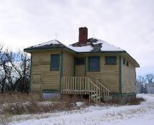 Front elevation featuring typical one room school architecture.; Government of Saskatchewan, J. Bisson, 2003.