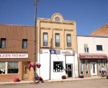 Contextual view, from the south, of the Thomas Poole Building, Baldur, 2005; Historic Resources Branch, Manitoba Culture, Heritage and Tourism 2005