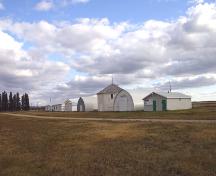 Contextual view, from the northwest, of the Carberry Agricultural Display Building (centre), Carberry, 2006; Historic Resources Branch, Manitoba Culture, Heritage and Tourism 2005