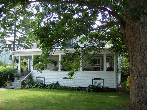 Front elevation showing sunroom