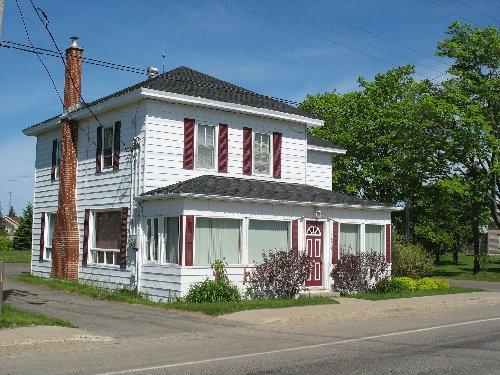 Edmund Roussel House - front and right side view