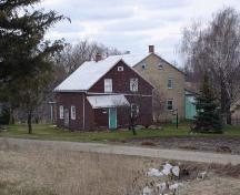 View of the Doddy House and Mennonite Georgian style two-storey main house, 2007.; Kendra Green, 2007.