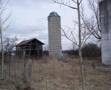 Poured concrete silo located next to the barn, 2007.; Kendra Green, 2007.