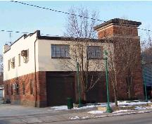 A three-storey hose drying tower is the focal point of the former fire hall's facade.; City of Windsor, Nancy Morand, 2005