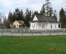 Context view of the Harrower House behind its neighbour the Lamb/Stirling House.; Township of Langley, Julie MacDonald, February 2004.