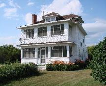 View of the front facade and the double verandah.; Brett Quiring, 2007.