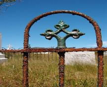 Iron fence detail, St. Cecilia Cemetery, St. Lawrence, NL.  Photo taken September 2006.; HFNL/ Dale Jarvis 2006