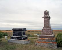 View, from the east, of the Thomas Greenway Cemetery, Crystal City, 2006. These stones mark the graves of two sons of Thomas Greenway, Harry and Thomas A.; Historic Resources Branch, Manitoba Culture, Heritage and Tourism, 2006