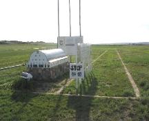 Photo of the site and barn model (facing west), 2004.; Government of Saskatchewan, Marvin Thomas, 2004.