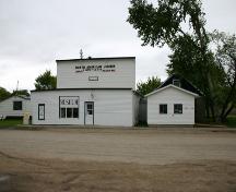 View of main elevation of the North American Lumber Co. Building, Binscarth 2005; Historic Resources Branch, Manitoba Culture, Heritage, Tourism and Sport, 2005