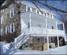 Featured is the verandah that spans the length of the south facade.; Lindsay Benjamin, 2007.
