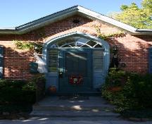 Detail of main entrance with Tudor-style arched transom; Susan Schappert, 2007