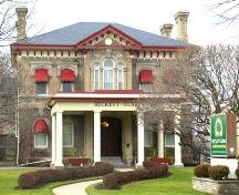 Featured is the frontispiece with its triple window with semi-circular frames, 2004.; City of Brantford, Department of Planning, 2004.