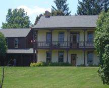 Featured is the east elevation with plaster construction.; Kendra Green, 2007.