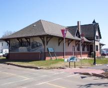 Showing former rail station with mural on the side; Wyatt Heritage Properties, 2005