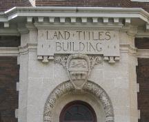 Image of detailed stone work on front façade of building, 2004.; Government of Saskatchewan, Maureen Pedersen, 2004.