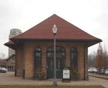 West facing façade featuring the main entrance, 2007.; Kayla Jonas, 2007.