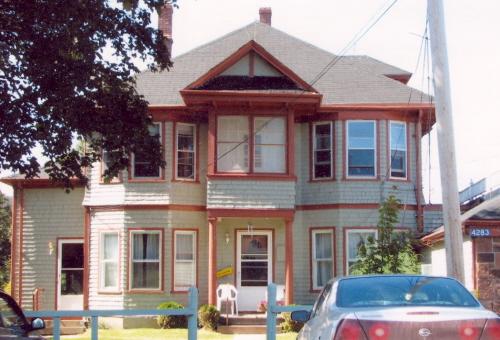 Showing east elevation with symmetrical facade