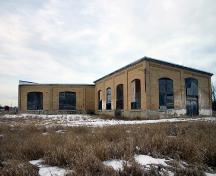 Contextual view, from the southeast, of the Reston Canadian Pacific Railway Engine House, Reston, 2005; Historic Resources Branch, Manitoba Culture, Heritage, Tourism and Sport, 2005