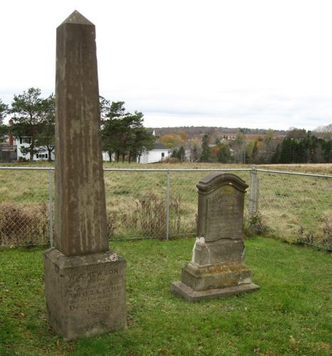 Showing two headstones