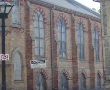 Of note are the lancet arches above the windows on the south elevation.; Kendra Green, 2007.