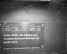 Plaque located on bulkhead, on main facade. Photo taken 2008.; HFNL 2008