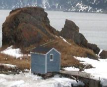 Photo of The Quidnock, looking towards the ocean at Stage Cove, Conche, NL, 2007.; Courtesy of French Shore Historical Society, 2008