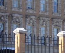 Detailed view of the molded      
pedimented windows of 227 King Street South, 2007.; Kayla Jonas, 2007