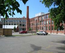 Of note are the powerhouse chimney and former bleach house.; Lyndsay Haggerty, 2007