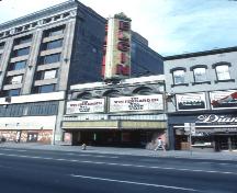 Exterior view of the Elgin and Winter Garden Theatres, showing its classically inspired, masonry and terracotta façade with an ornate marquee.; Parks Canada Agency / Agence Parcs Canada.