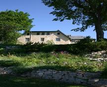 Contextual view from the Red River of the Captain William Kennedy House, Lockport area, 2005;  Historic Resources Branch, Manitoba Culture, Heritage, Tourism and Sport, 2005