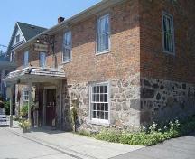 Of note is the use of field stone on the first-storey and brick on the second.; Kayla Jonas, 2007.