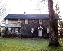 Street facing view of Gill House, showing central door of stone structure; City of Fredericton