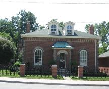 Of note is the frieze along the boxed eaves, reminiscent of a Romanesque corbel table frieze.; Beatrice Tam, 2008.