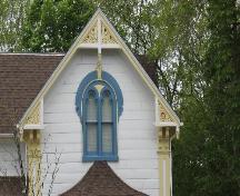 Featured is a paired window with a decorative window surround.; Chelsey Tyers, 2008.