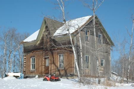 Side view of Backwoods Beds and Berries Log Home