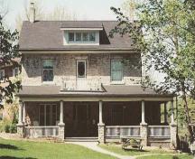 Of note is the symmetrical two-storey facade and full wrap-around veranda.; Gord Strathdee, 2007.