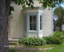 This photograph illustrates the single-storey bay window, 2009; Town of St. Andrews