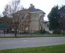 Of note are the bay windows and red-brick banding.; Kayla Jonas, 2007.