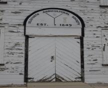 Featured is the double door entrance with diagonal panelling.; Kayla Jonas, 2008.
